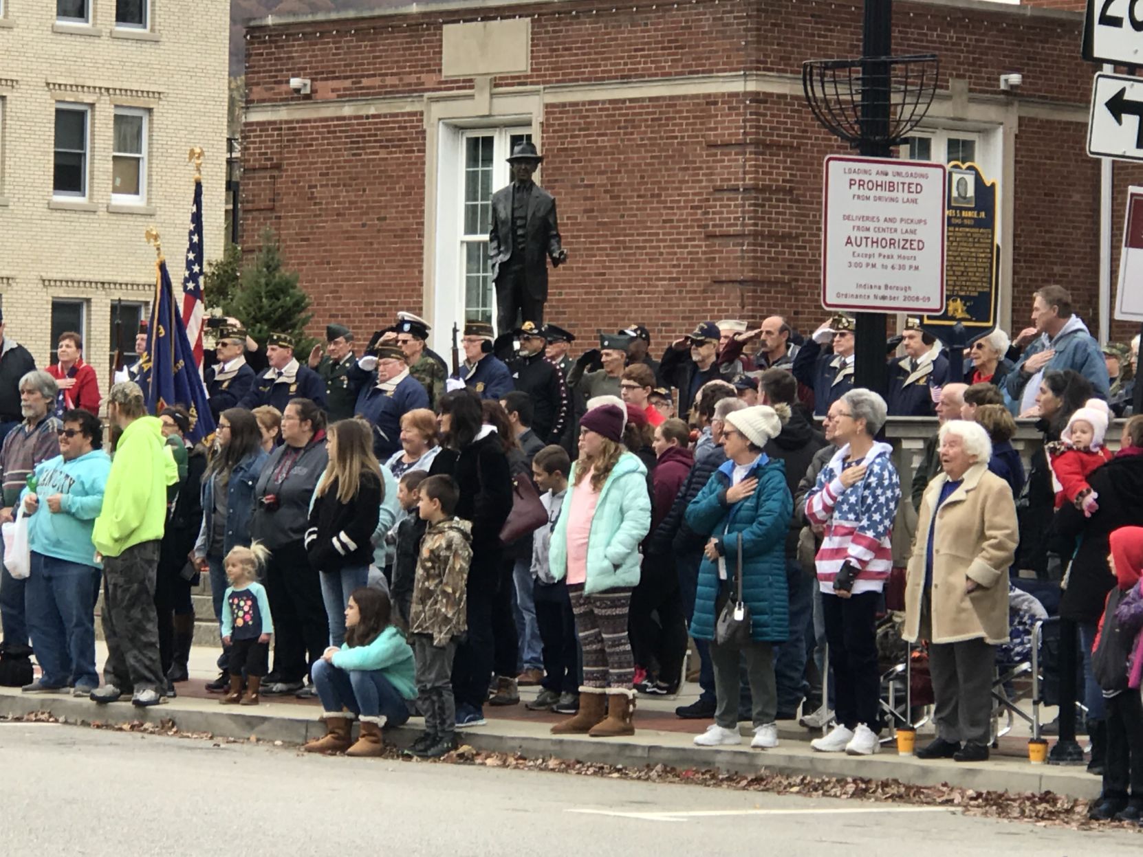 Parade watchers wait